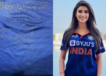 Virat Kohli's autographed shirt is worn by Afghan social media star Wazhma Ayoubi to promote India before the Asia Cup Final.