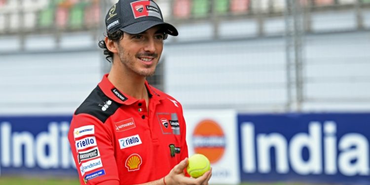 In preparation for India's first-ever MotoGP race, world champion Francesco Bagnaia plays some cricket. 1 In preparation for India's first-ever MotoGP race, world champion Francesco Bagnaia plays some cricket.