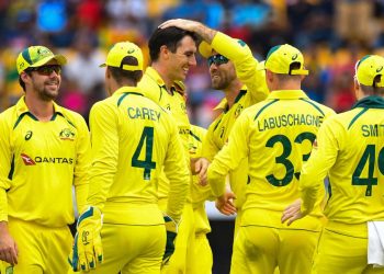 Why are the Australian players wearing black armbands during their match against the Netherlands at the 2023 World Cup?