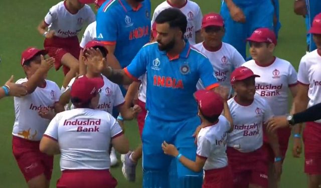 Before India's match against South Africa in 2023, children swarm Virat Kohli with birthday greetings. 1 Before India's match against South Africa in 2023, children swarm Virat Kohli with birthday greetings.