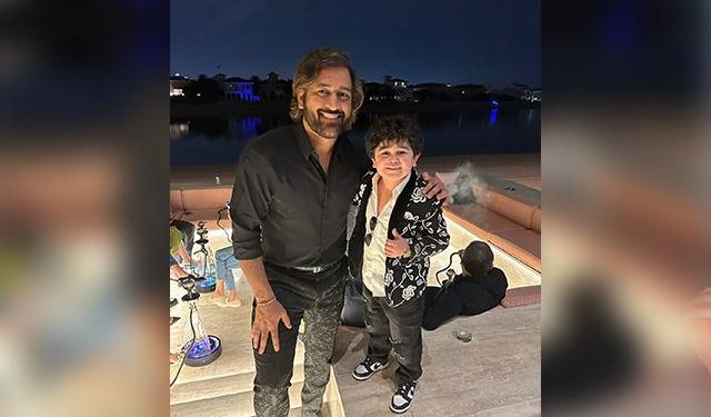 On vacation in Dubai, MS Dhoni poses with Abdu Rozik. 1 On vacation in Dubai, MS Dhoni poses with Abdu Rozik.