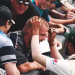 AUS vs PAK: Hasan Ali makes a humorous gesture on a fan's forehead during the Boxing Day Test; the image goes viral 7 AUS vs PAK: Hasan Ali makes a humorous gesture on a fan's forehead during the Boxing Day Test; the image goes viral