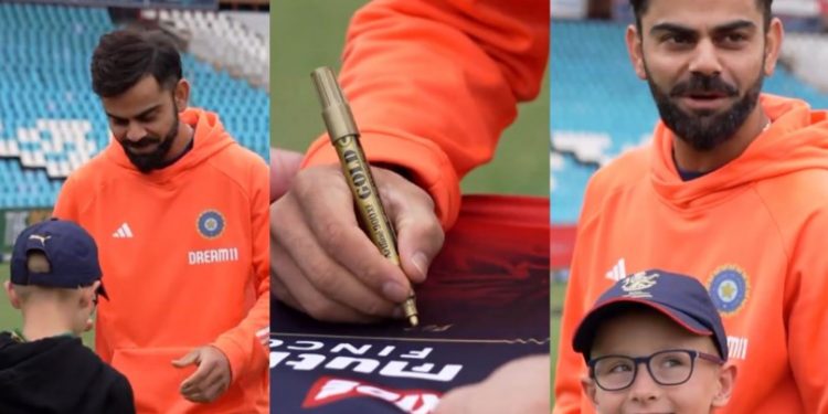SA vs. IND: Virat Kohli autographs an RCB jersey for a young Centurion supporter 1 SA vs. IND: Virat Kohli autographs an RCB jersey for a young Centurion supporter