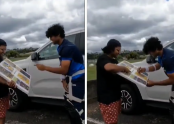 Rachin Ravindra autographs a poster for a New Zealand CSK supporter.