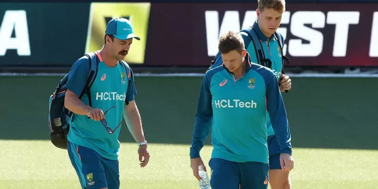 Travis Head returns negative, but Andrew McDonald and Cameron Green test positive for COVID-19.