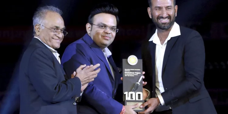 At Rajkot's Niranjan Shah Stadium, Cheteshwar Pujara was feted.