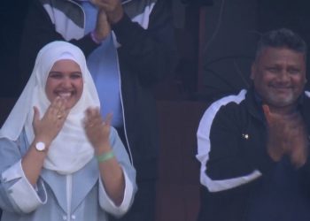 Sarfaraz Khan's wife and father celebrate his first half-century milestone by blowing kisses during the IND vs. ENG game.