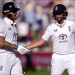 Root anchors England on challenging day