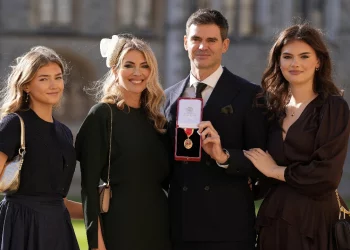 James Anderson receives knighthood in royal ceremony